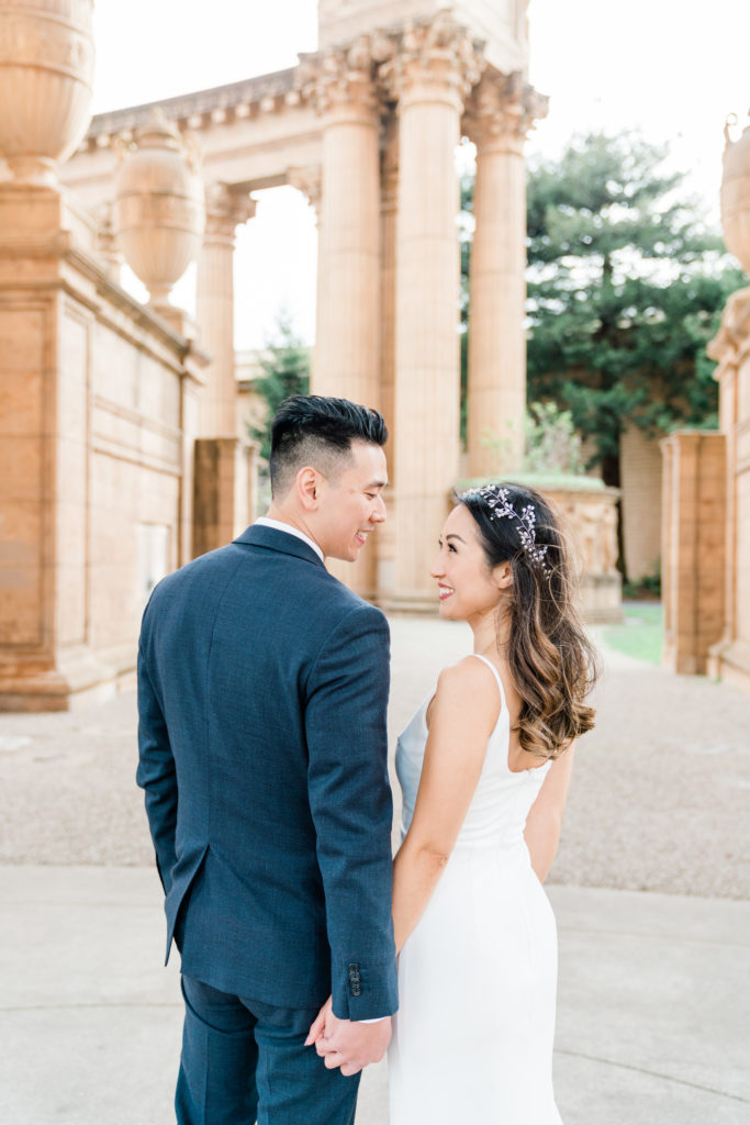 palace of fine arts engagement session in front of the pillars