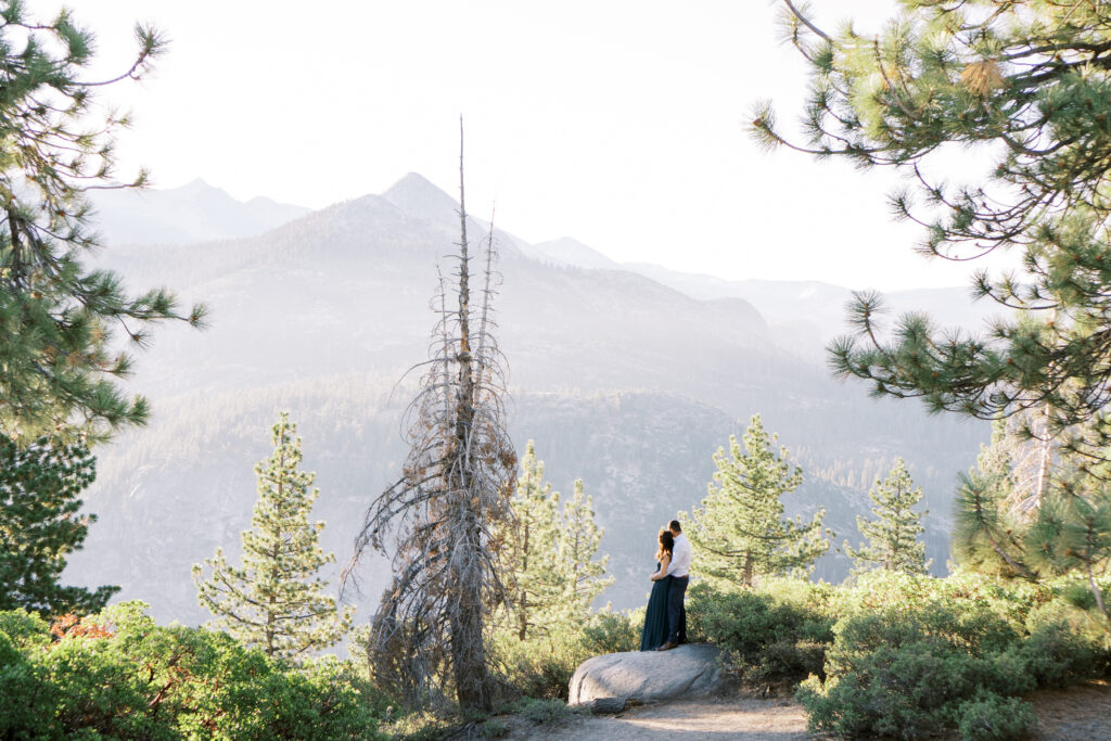 couple standing overlooking the mountains