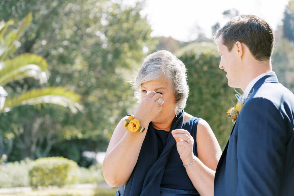 groom mother crying in happy tears