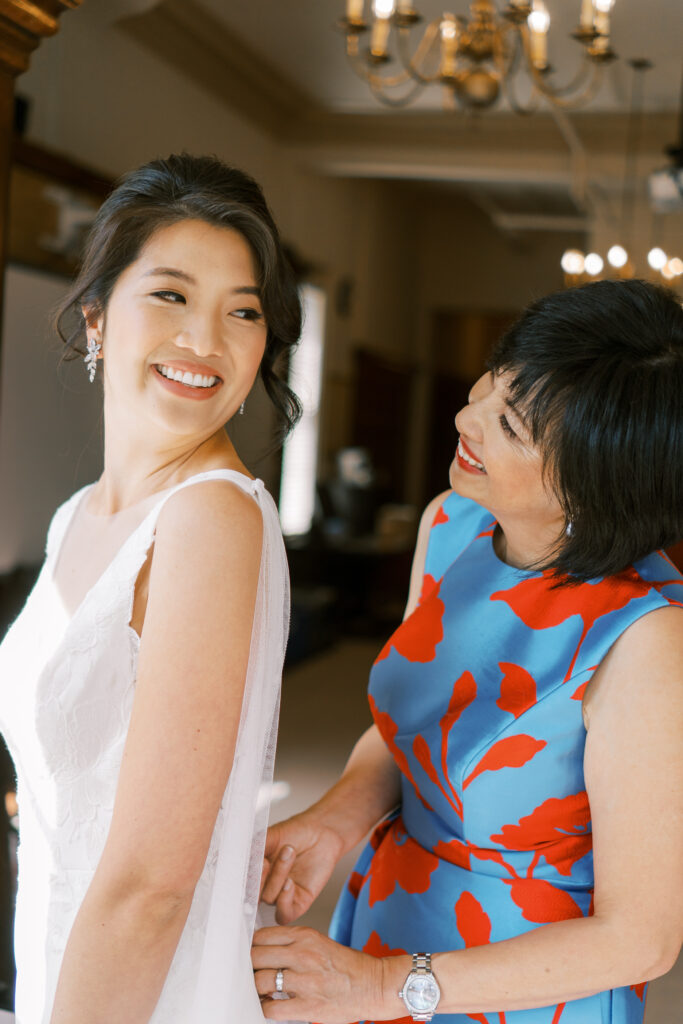 mother and daughter intimate moments before wedding ceremony
