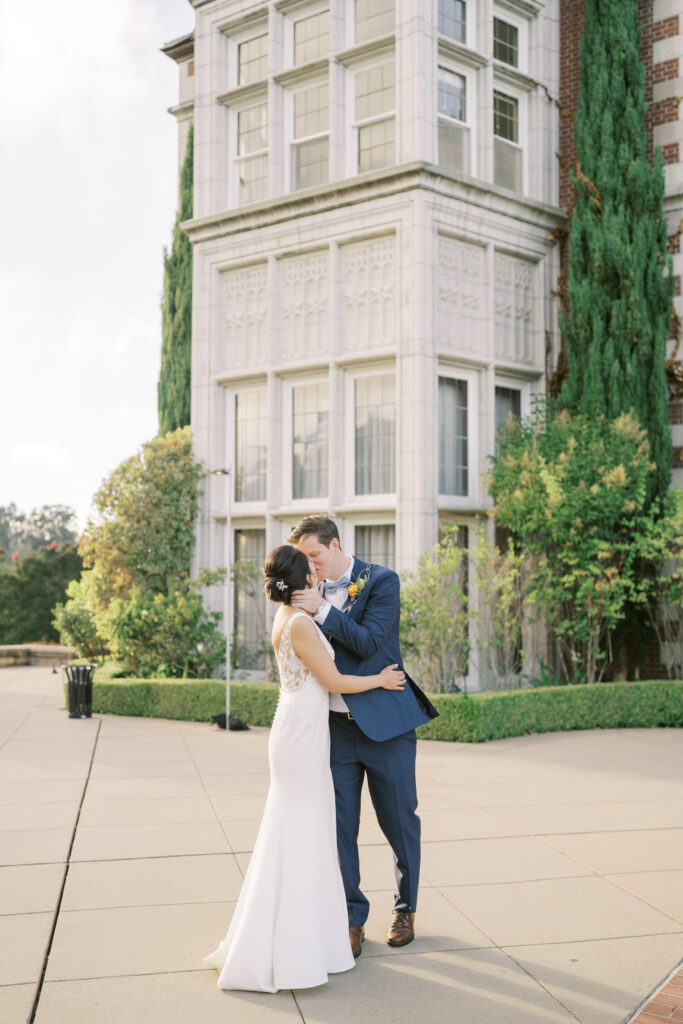 Bride and groom sharing a romantic kiss