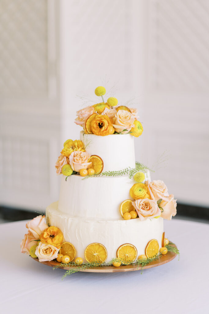Multi-tiered cake with delicate icing details