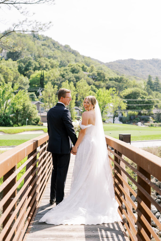 groom looking at bride