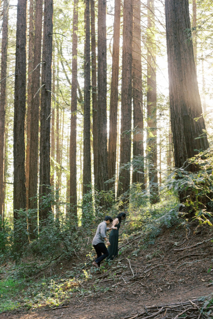 couple hiking engagement photo session at redwood glen trailhead 