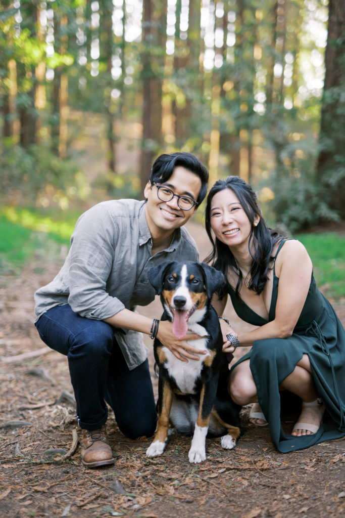 couple with dog pose photo in nature
