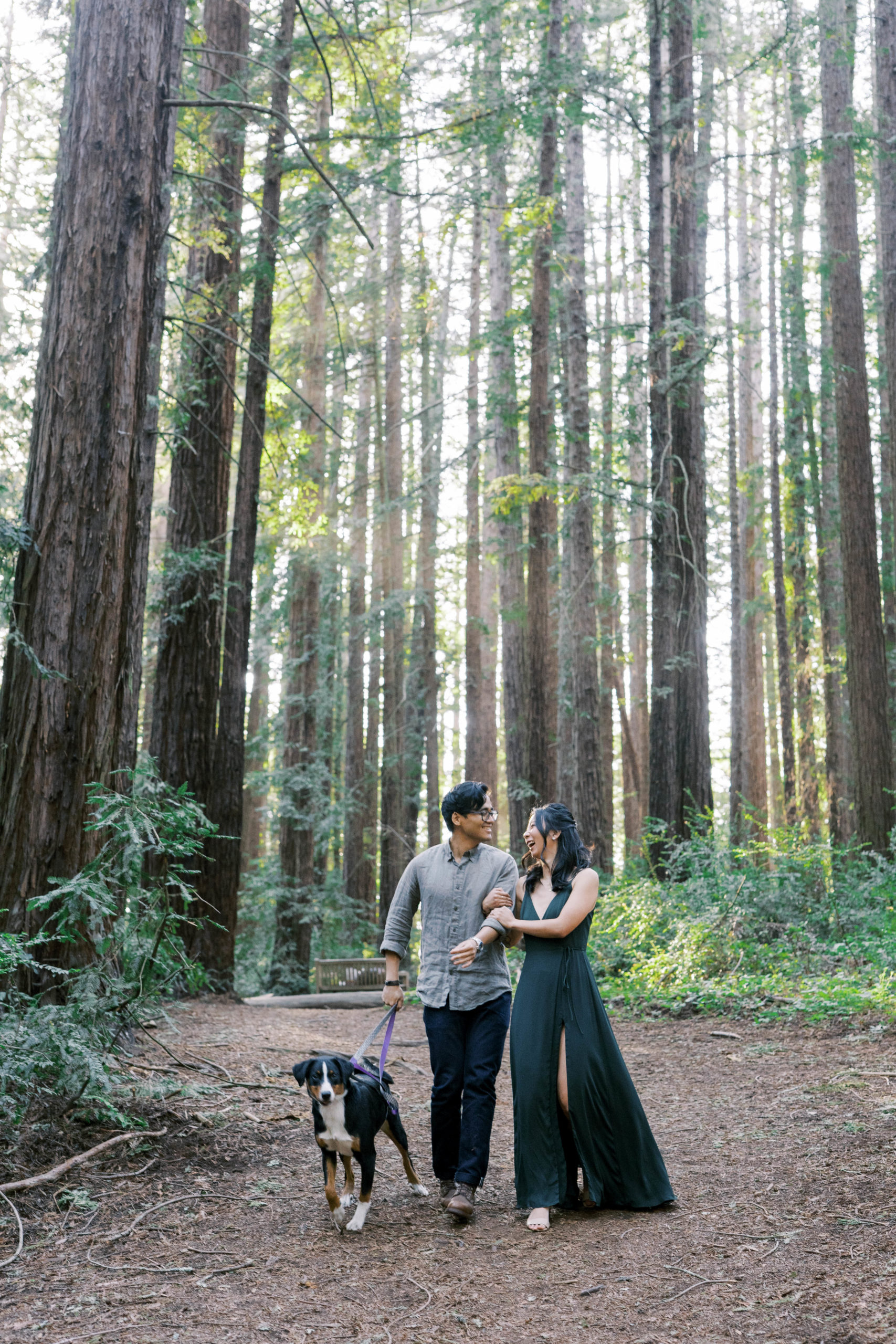 family with dog candid photo in forest