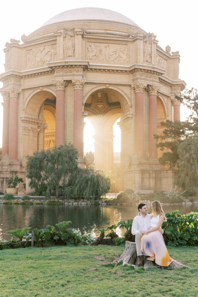 posed photo of engaged couple at Golden Palace of Fine Arts