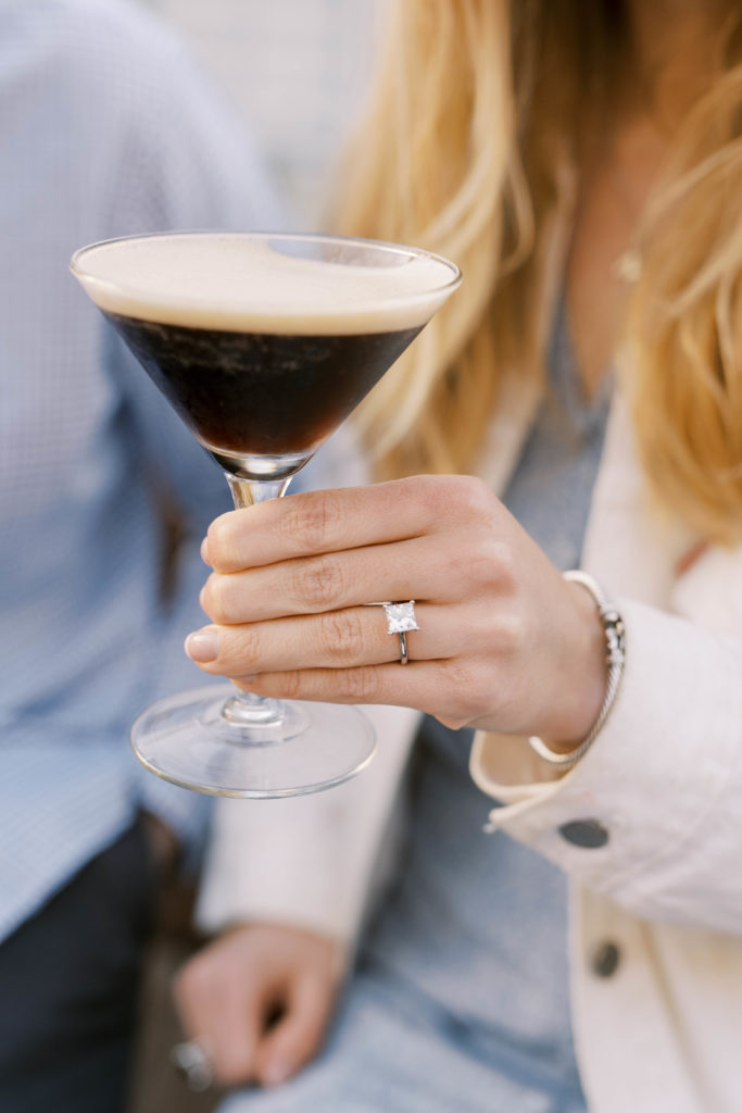 woman holding espresso Martini cocktail