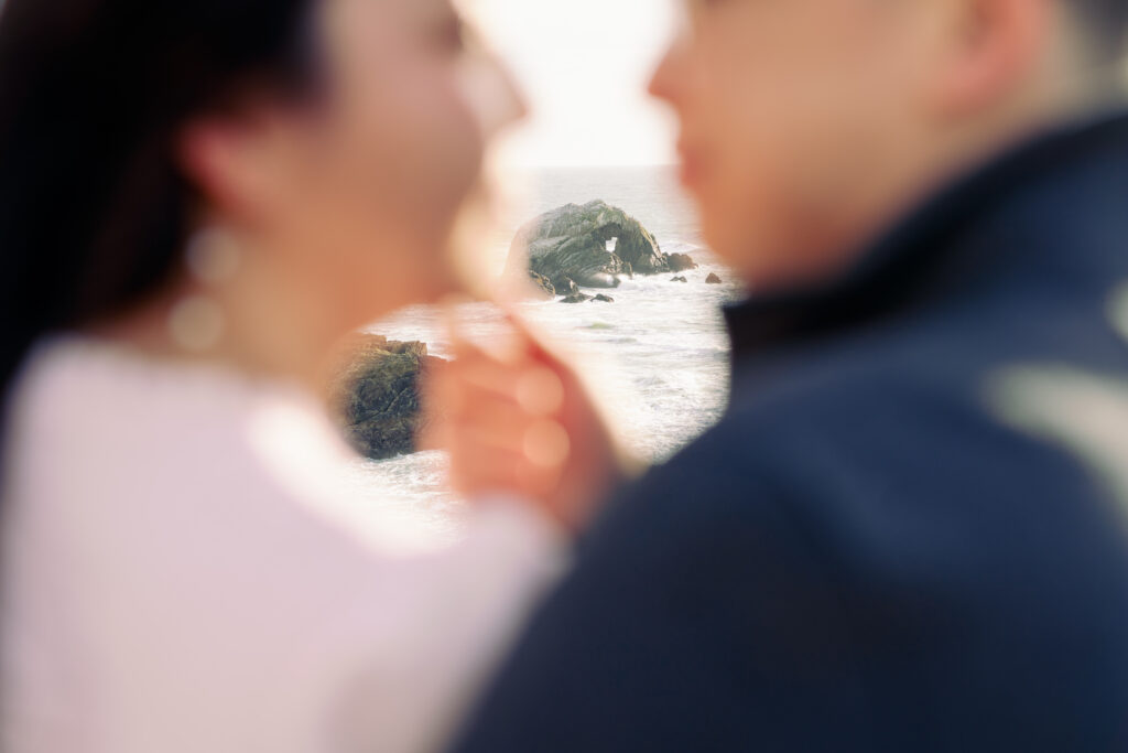 blurred shot of the couple at the beach