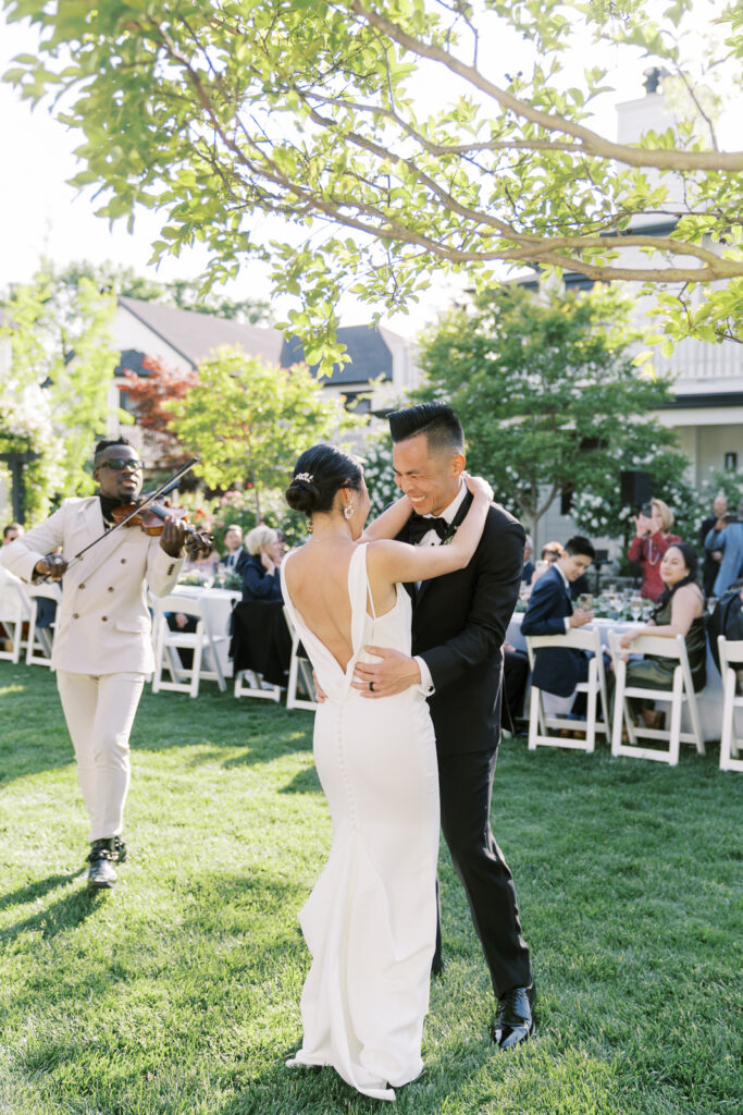 couple's first dance with violinist