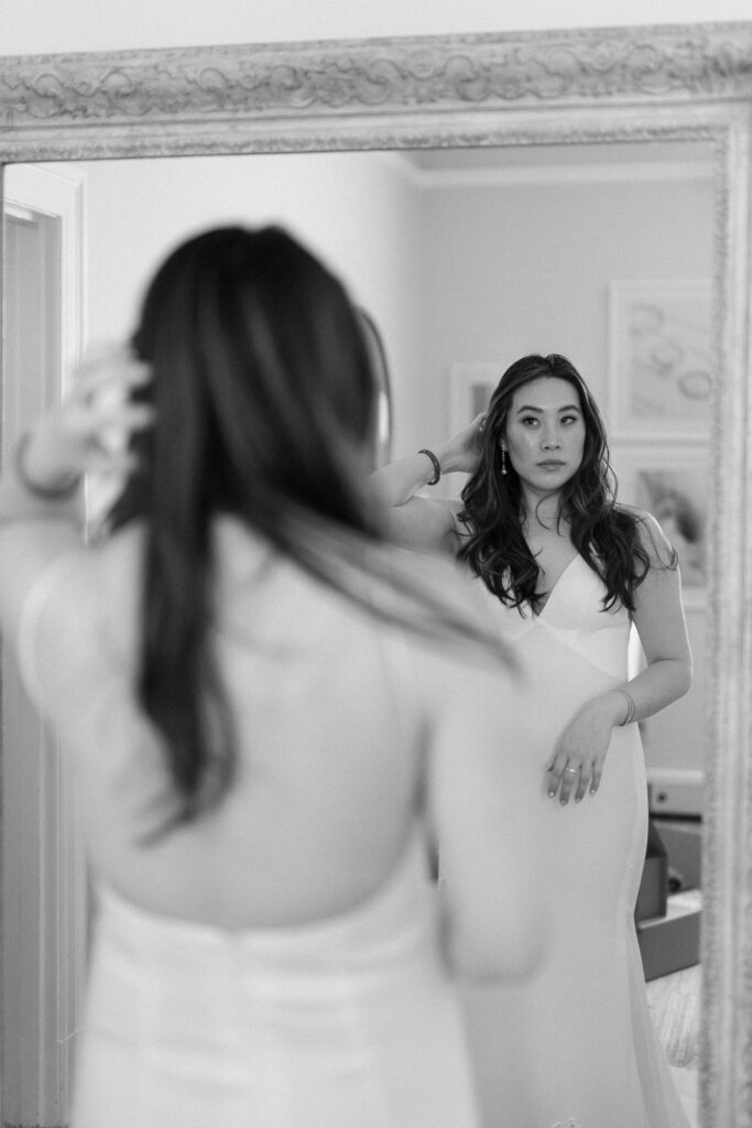 black and white bride in mirror