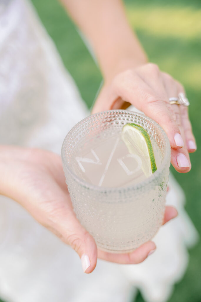 bride holding cocktail
