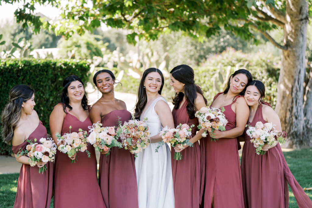 candid photo of bride with bridesmaids