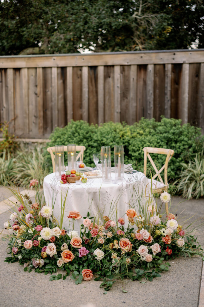 bride and groom reception table setup