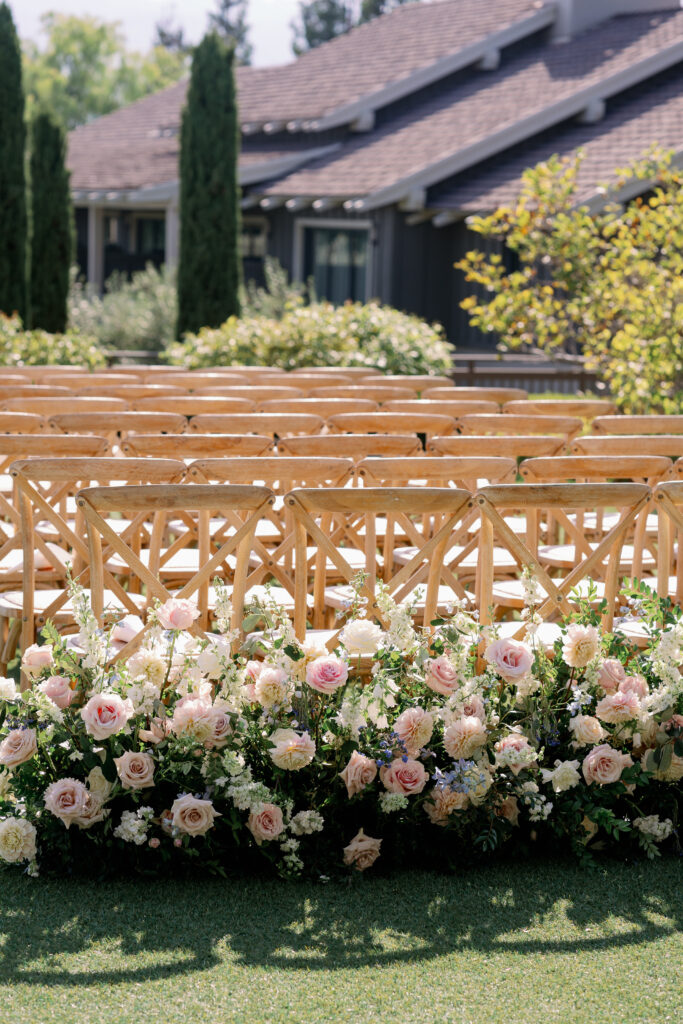 close up photo of the wedding ceremony floral arrangements
