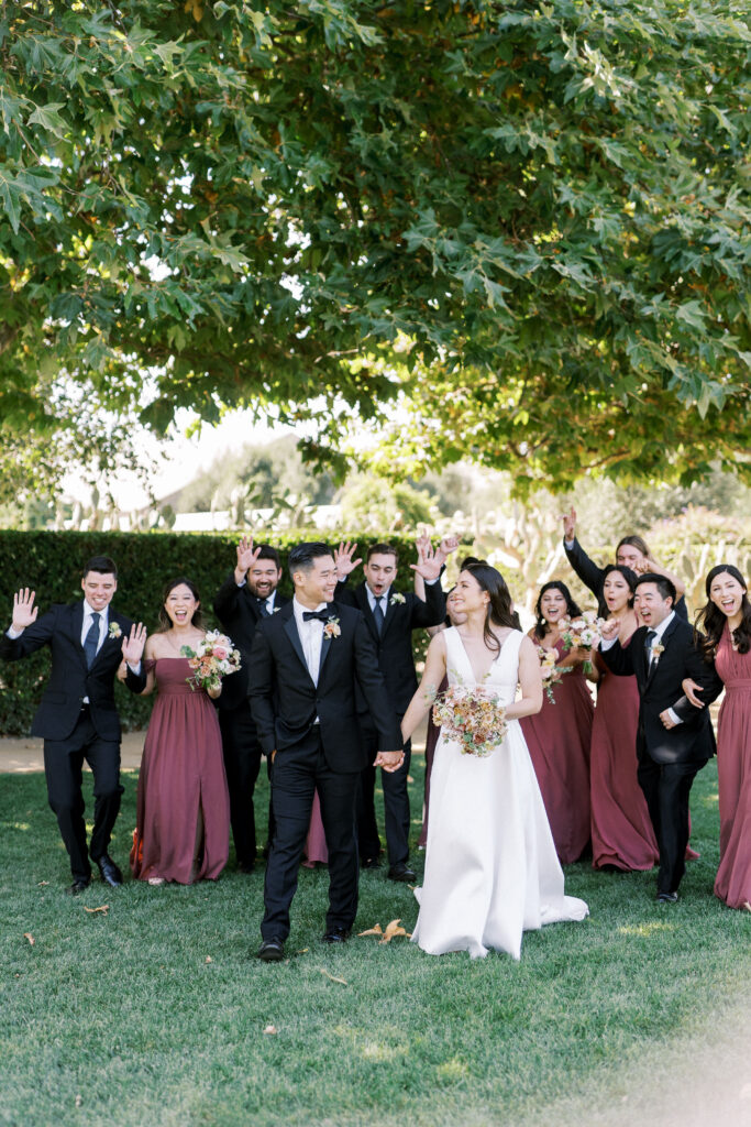 wedding party hyping bride and groom