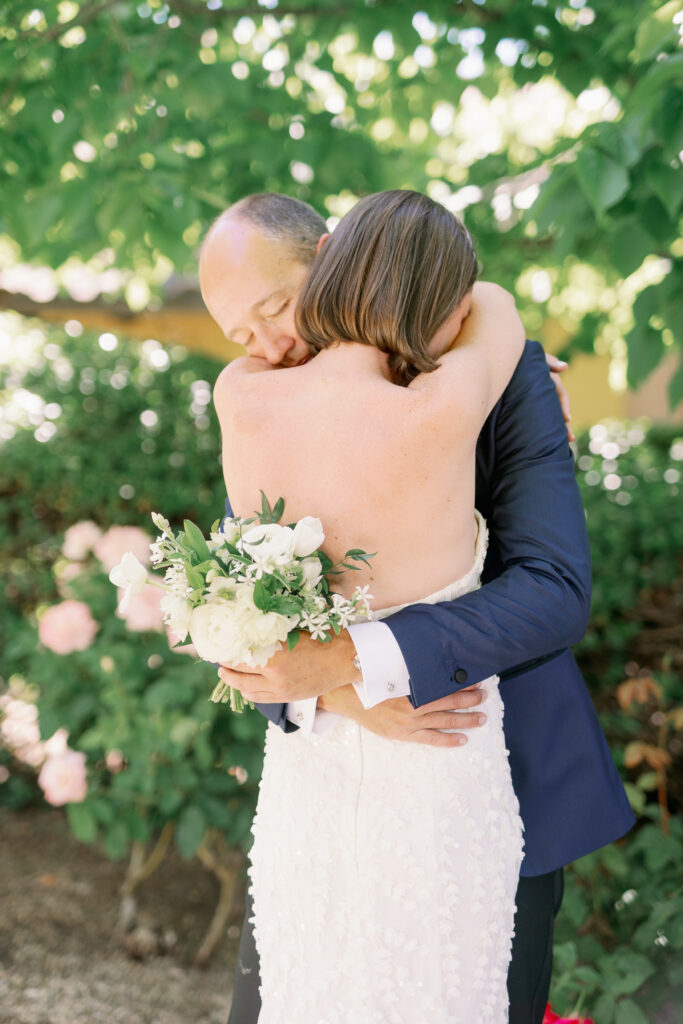 bride and groom in warm embrace