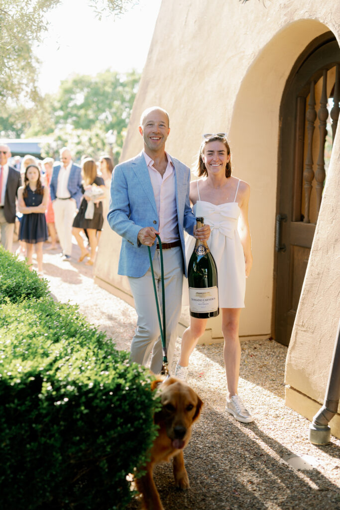 bride and groom arriving at their wedding rehearsal dinner