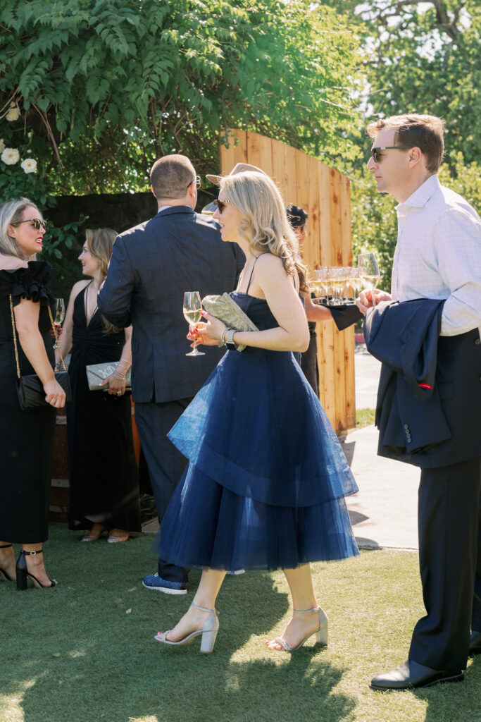 wedding guest in blue dress