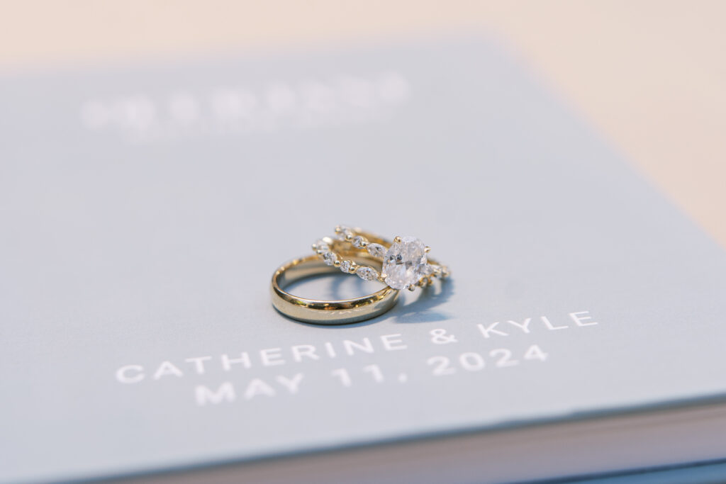 Ring on top of vow books
