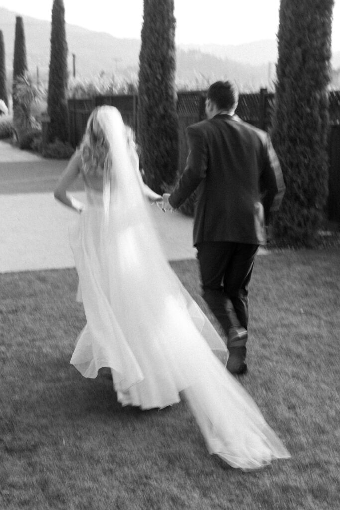 blurry photo of bride and groom in black and white