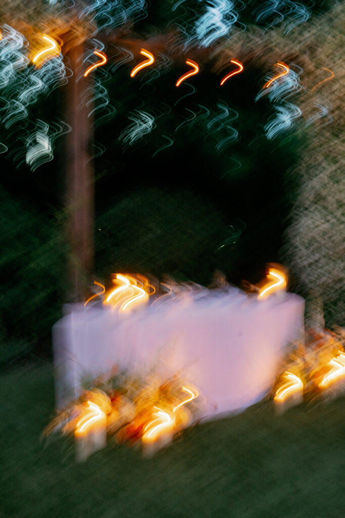 blurry photo of bride and groom's reception table