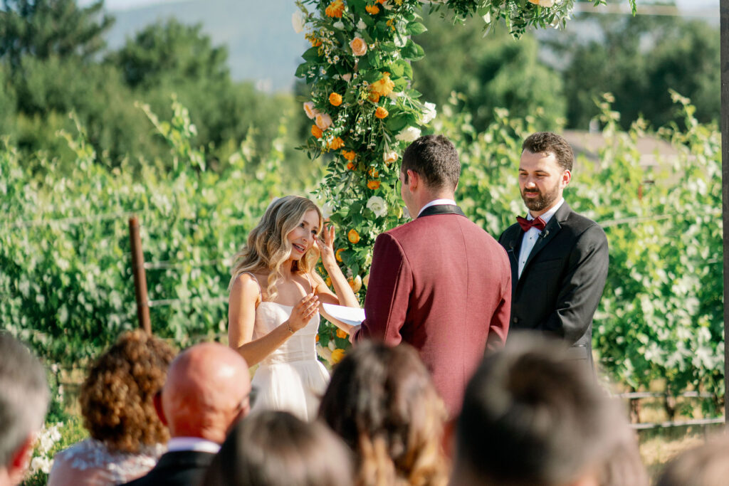 bride crying during exchange of vows